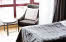 Photo by: ©Erik Abel. All rights reserved. Chair and table in room Superior